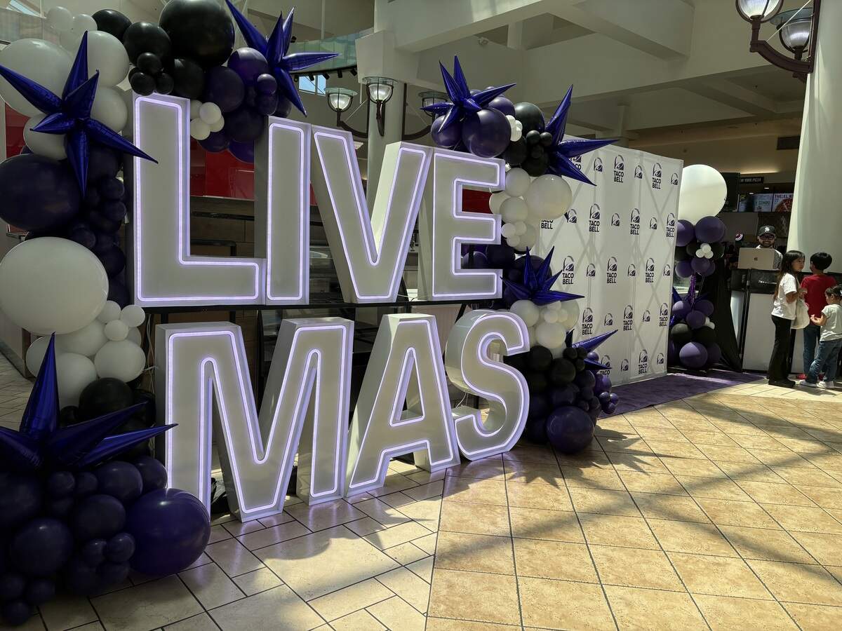 Taco Bell brought in decorations, like a photo backdrop, to celebrate its grand opening Saturday at Arden Fair mall.